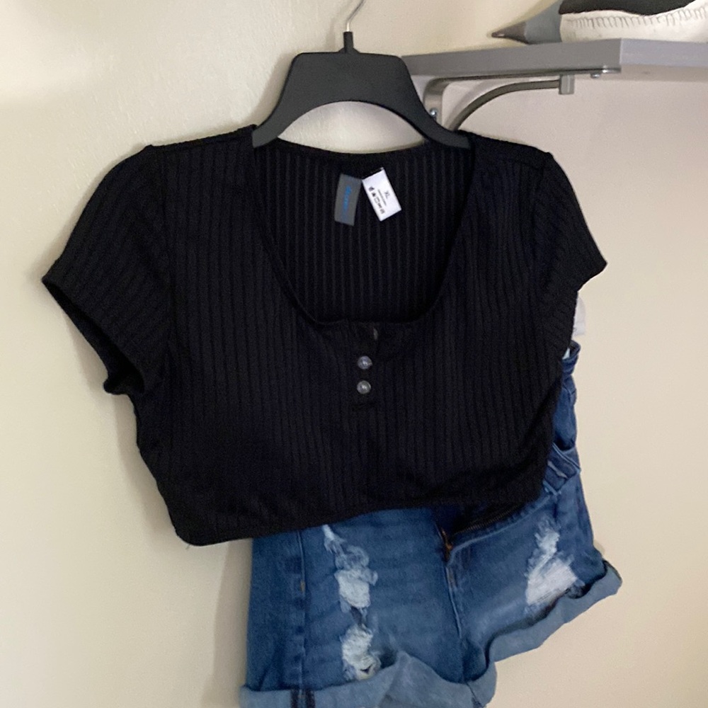 Top black buttons